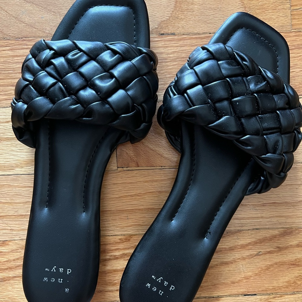Never worn black braided sandals. Size 9.